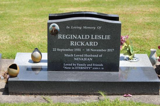 Classic upright headstone with low saddle top, crafted from polished granite by Mark Memorials in Levin, New Zealand.