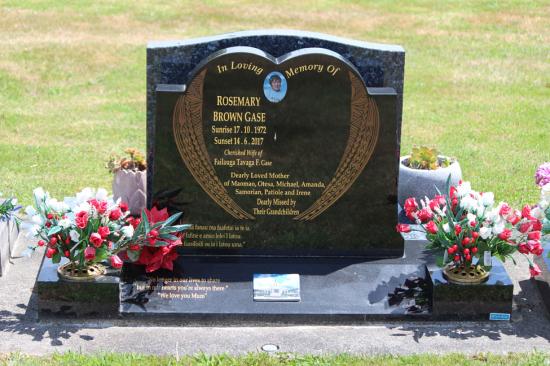 Modern upright double headstone with heart shape, crafted from polished granite by Mark Memorials in Levin, New Zealand.