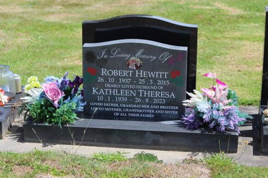 Classic upright companion headstone with low saddle top, crafted from polished granite by Mark Memorials in Levin, New Zealand