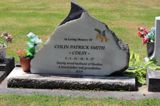 Natural stone headstone in white, by Mark Memorials in Levin, New Zealand.