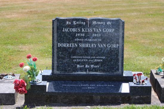 Classic upright double headstone in a book shape, crafted from polished granite by Mark Memorials in Levin, New Zealand